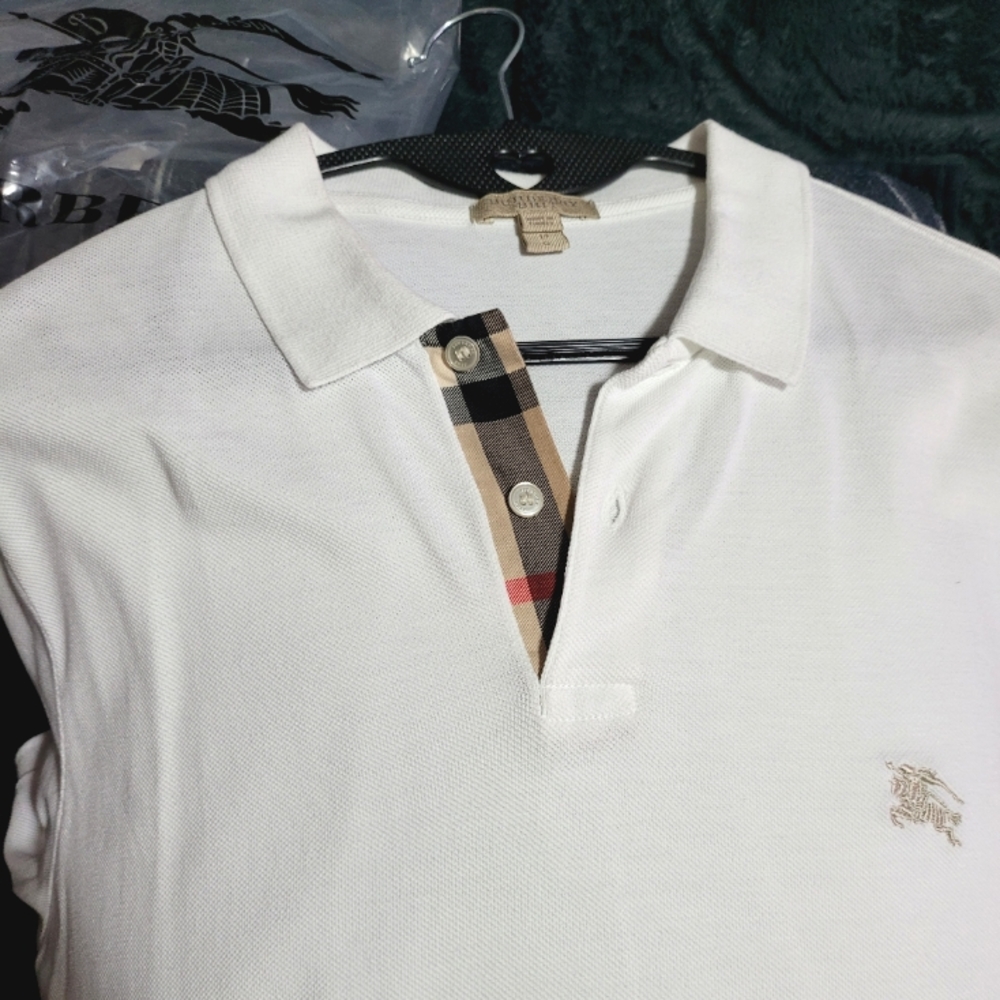 Like new White Burberry Polo shirt.